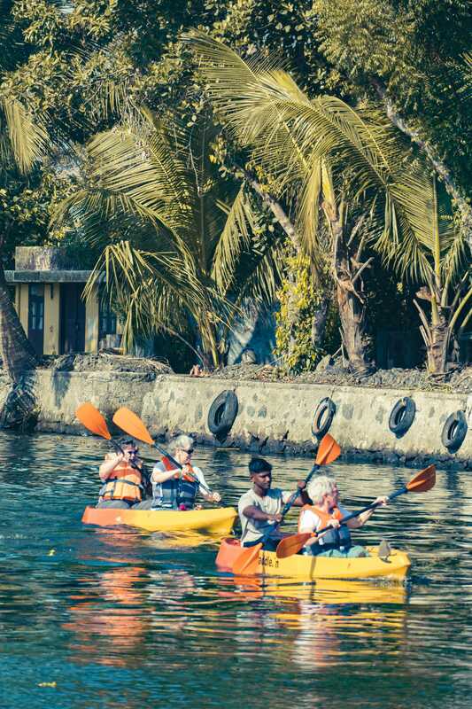 Backwater kayaking trail through quiet Alappuzha canals