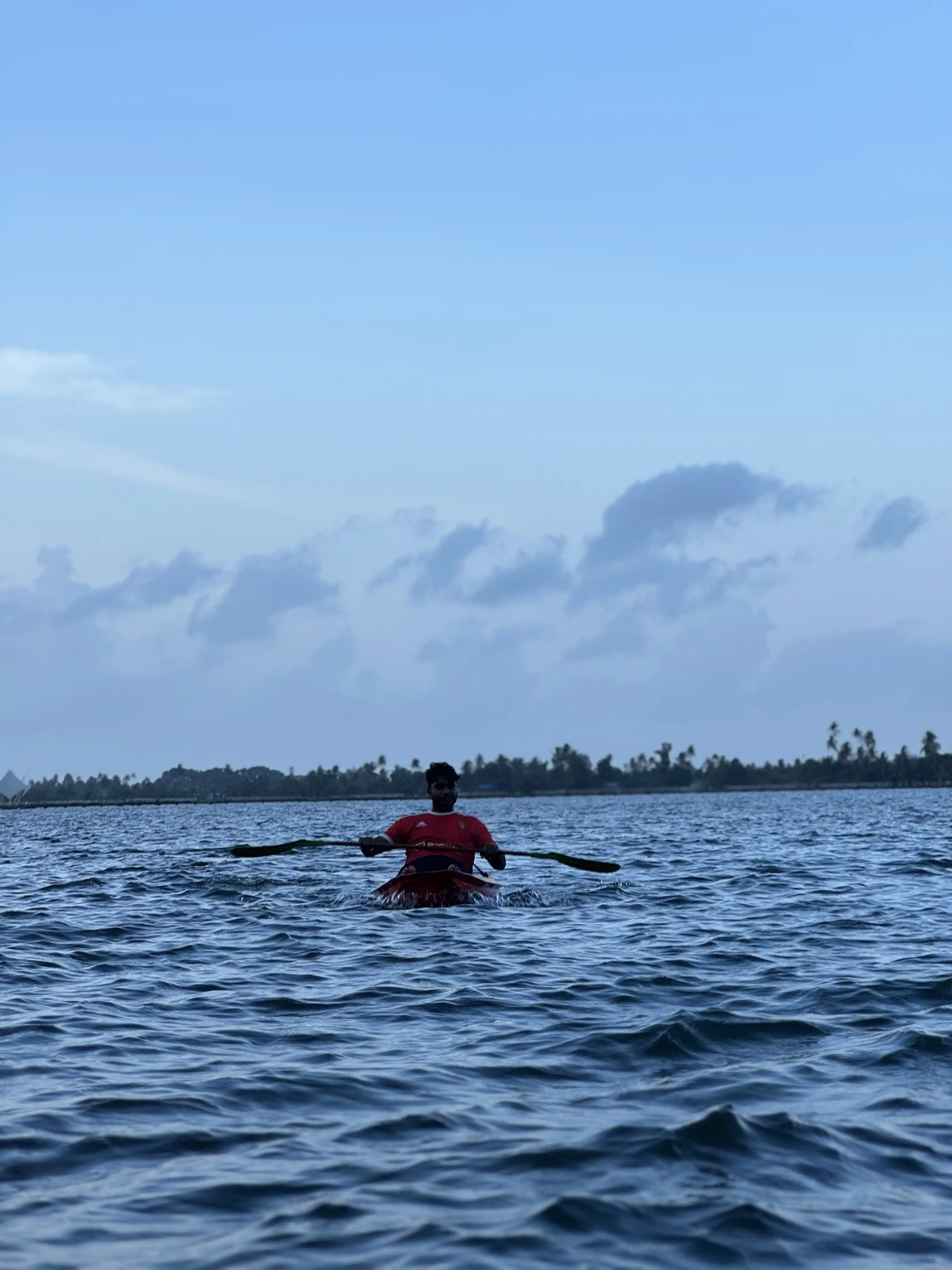 Guided kayaking route through quiet Alappuzha backwater canals